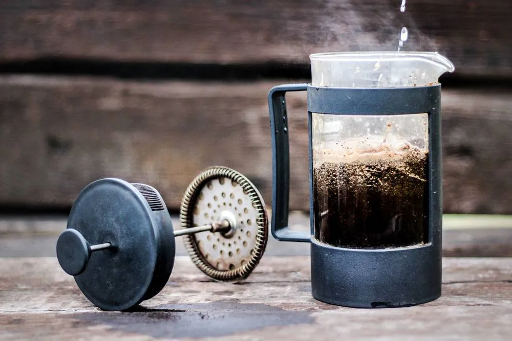 Prosessen med å lage kaffe: en fysisk eller kjemisk endring i handling? 1 proceso de preparacion del cafe